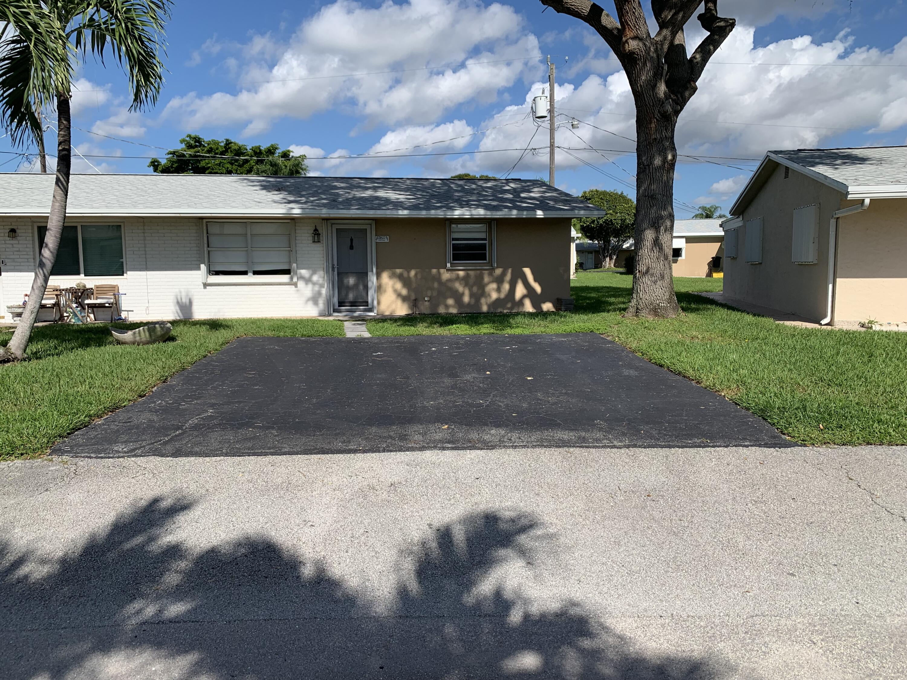 2822 Duke Lane Delray Beach, FL 33445 - Photo 1 of 12 Front