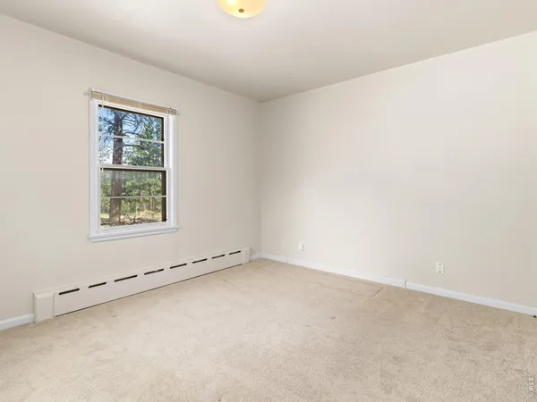 an empty room with a window