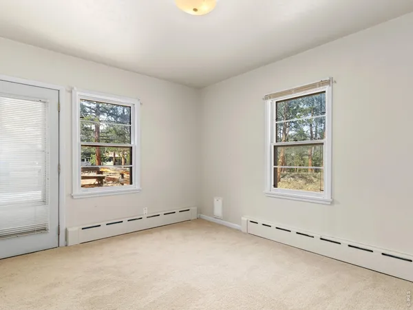 a bathroom with a toilet and a sink