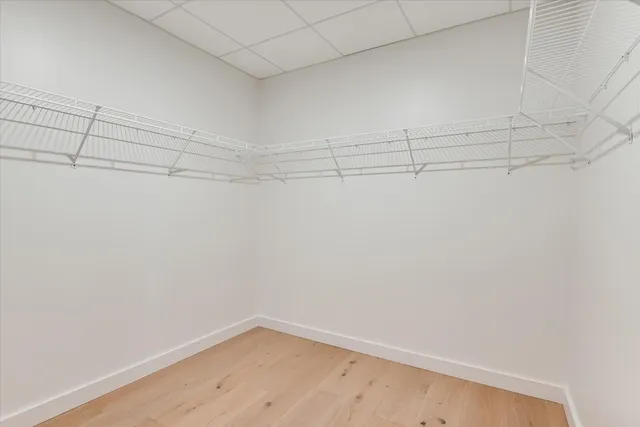 a view of a room with racks on the wall