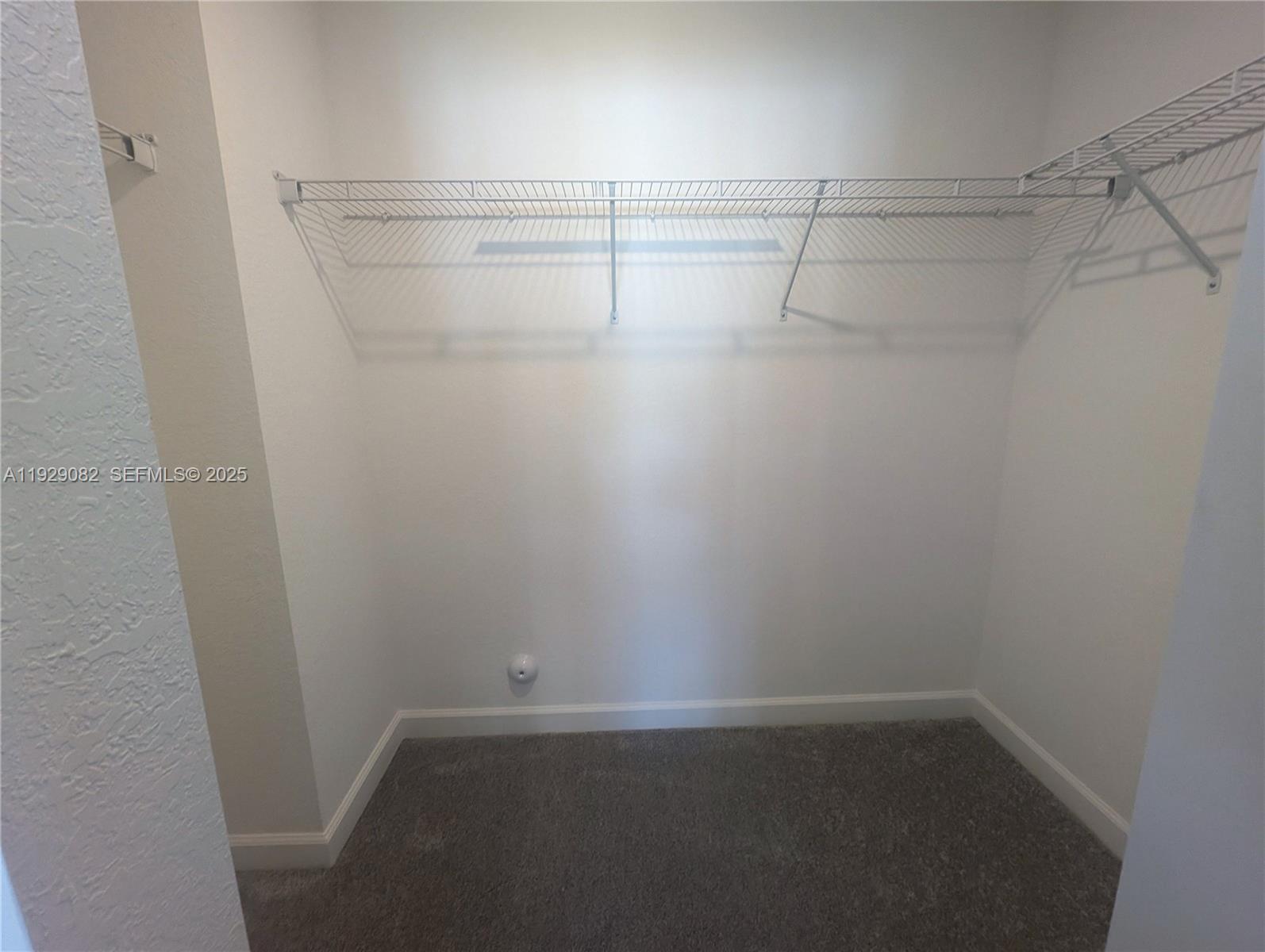 5180 Southwest 37th Street, Unit 5180 Hollywood, FL 33023 - Photo 18 of 25 a view of an empty walk in closet
