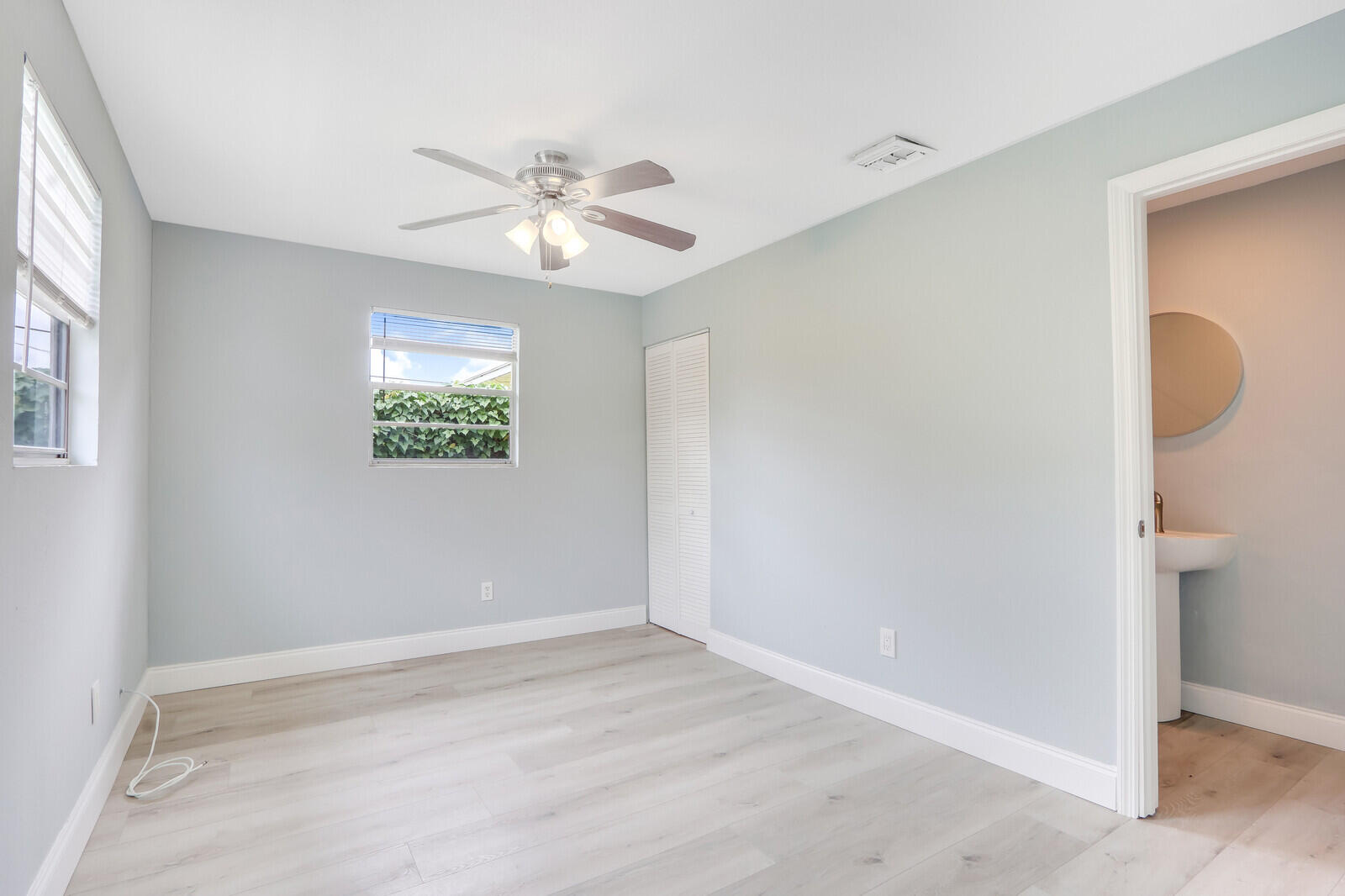 3852 Gull Road Palm Beach Gardens, FL 33410 - Photo 14 of 30 a view of an empty room with a window