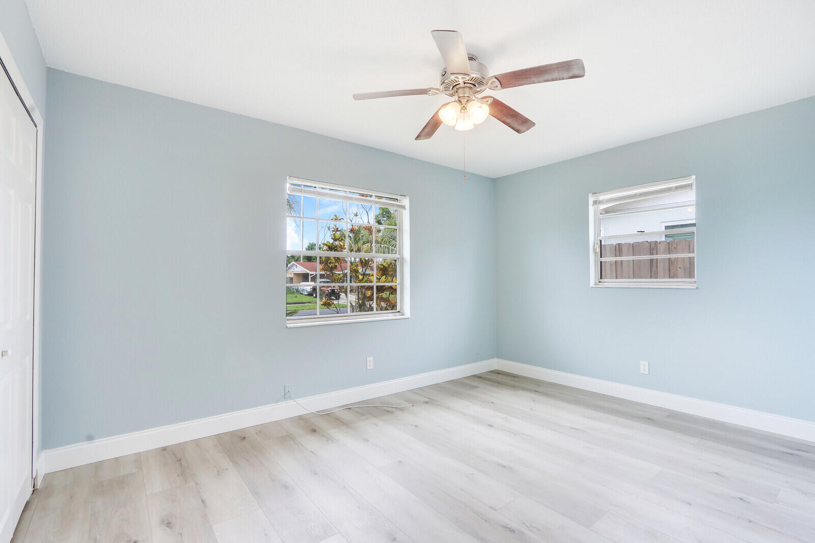 3852 Gull Road Palm Beach Gardens, FL 33410 - Photo 17 of 30 a view of an empty room with a window