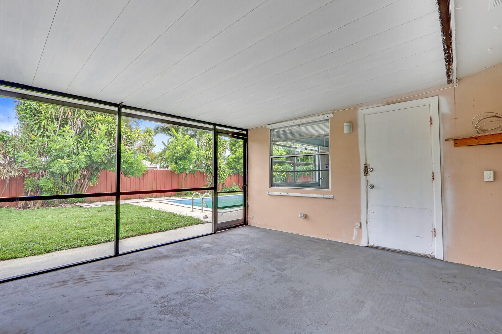 3852 Gull Road Palm Beach Gardens, FL 33410 - Photo 24 of 30 a view of empty room with floor to ceiling window