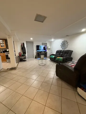 a living room with furniture and a couch