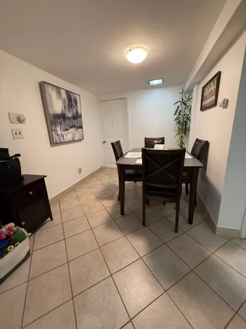 a view of a workspace with furniture