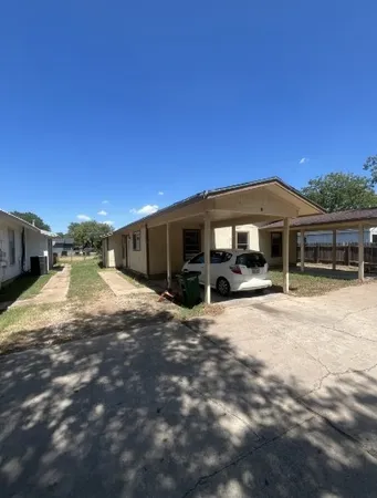 a view of a house with a patio