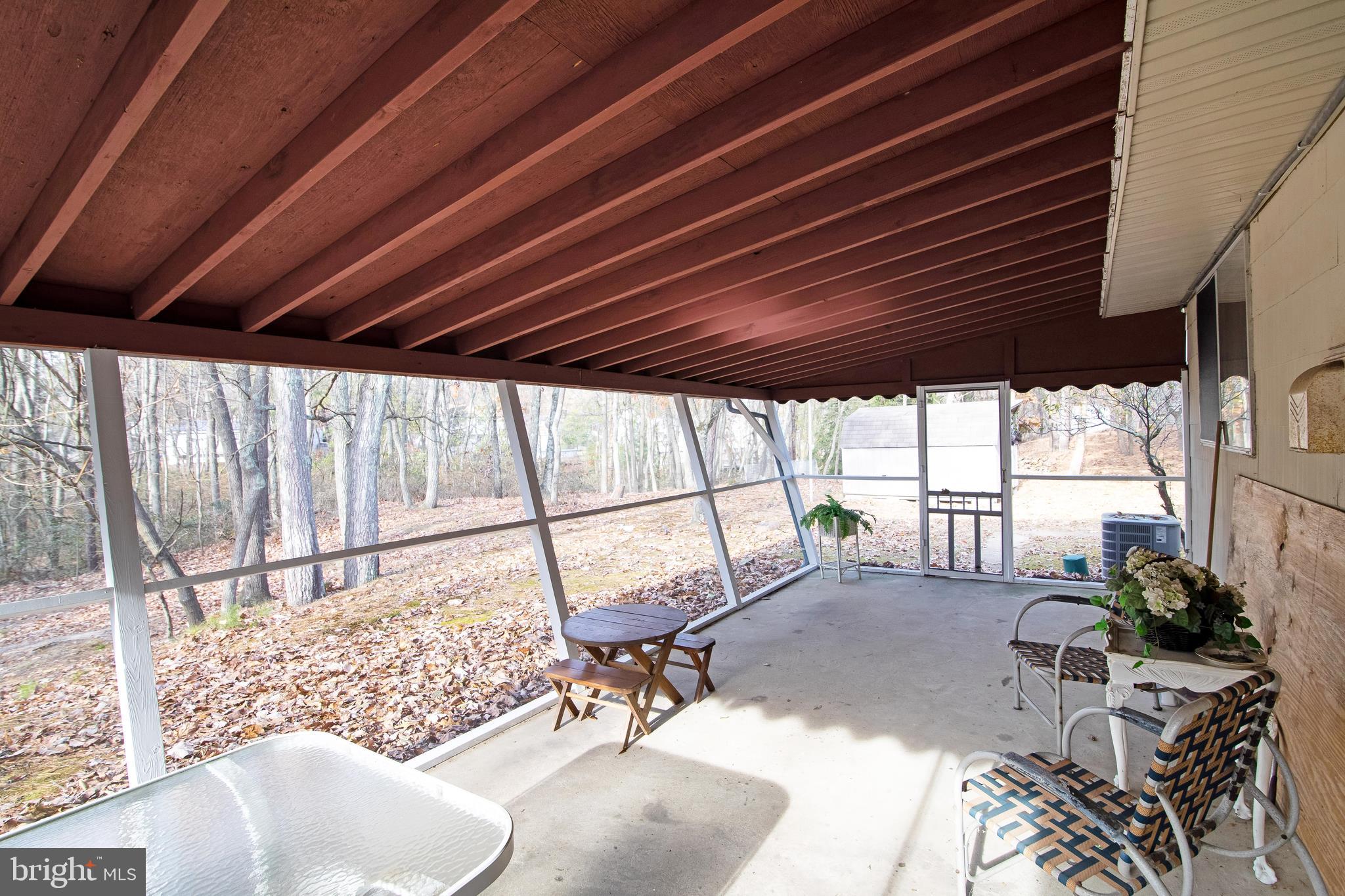 37 Penn Road Voorhees, NJ 08043 - Photo 14 of 45 screened porch with scenic views all around