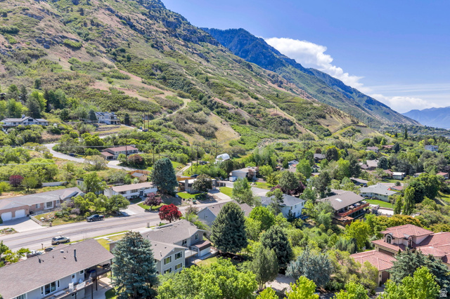 3813 North Foothill Drive Provo, UT 84604 - Photo 60 of 71 Residential area situated at the base of a verdant mountain range, featuring varied architectural styles and mature trees