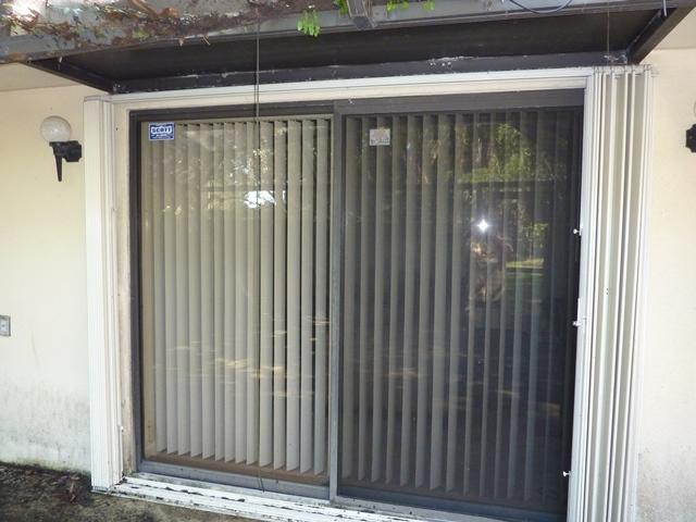 6902 69th Way West Palm Beach, FL 33407 - Photo 3 of 15 Accordian Shutters