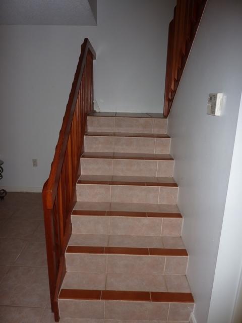 6902 69th Way West Palm Beach, FL 33407 - Photo 5 of 15 Tiled Stairs