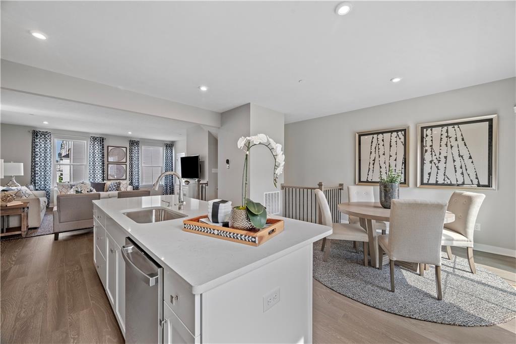 8100 Walnut Way Gibsonia, PA 15044 - Photo 11 of 40 a view of a dining room with furniture window and wooden floor