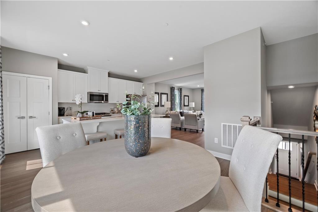 8100 Walnut Way Gibsonia, PA 15044 - Photo 14 of 40 a dining room with furniture a window and kitchen view