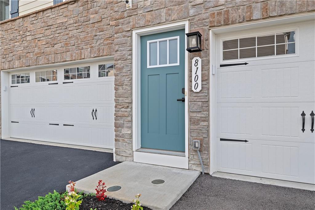 8100 Walnut Way Gibsonia, PA 15044 - Photo 2 of 40 a front view of a house with a yard