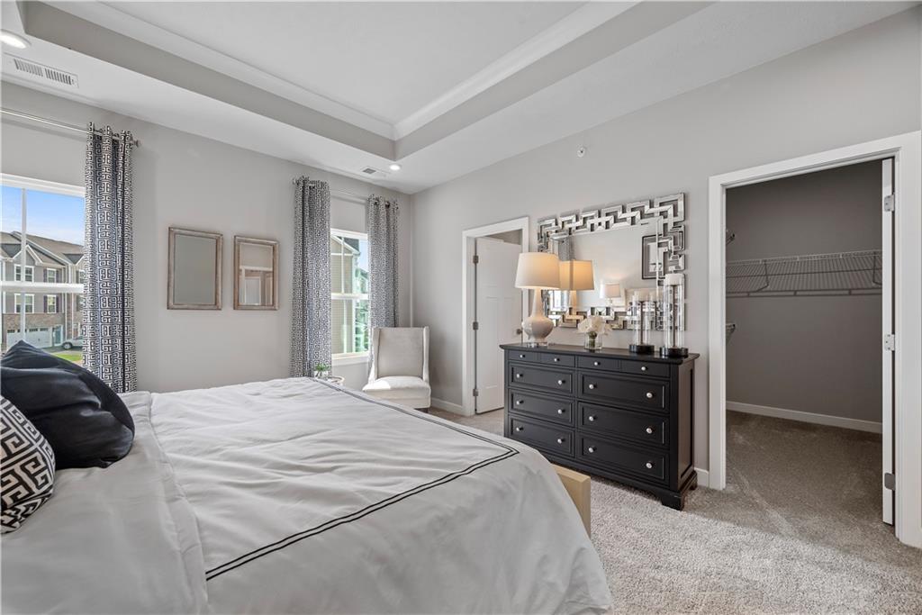 8100 Walnut Way Gibsonia, PA 15044 - Photo 21 of 40 a bedroom with a bed and a closet