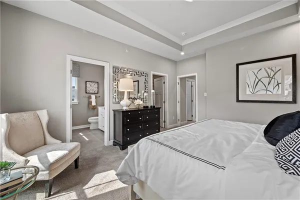 a bedroom with a bed and furniture