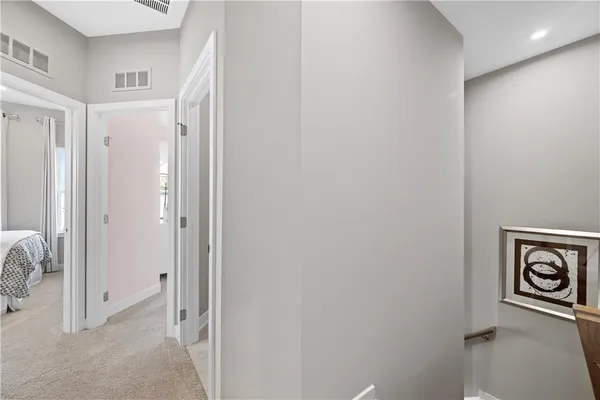 a view of a hallway with closet