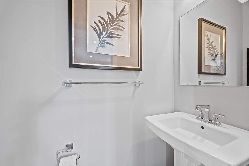 8100 Walnut Way Gibsonia, PA 15044 - Photo 32 of 40 a bathroom with a sink and a mirror