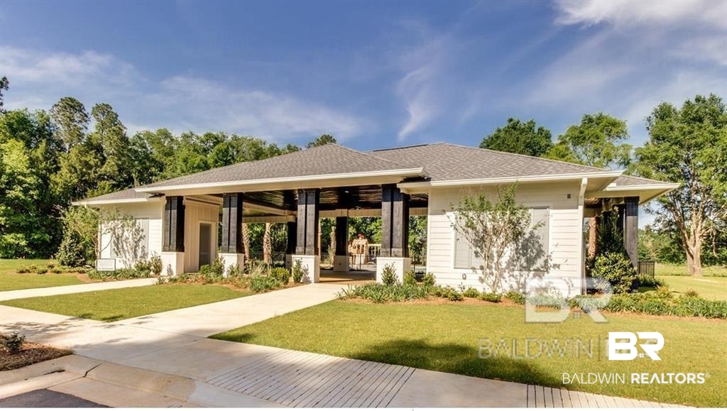 418 Fortune Drive Fairhope, AL 36532 - Photo 63 of 63 View of front of house featuring ceiling fan and a front yard
