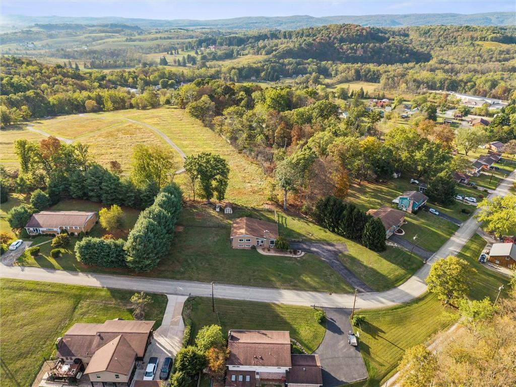 127 Singer Way Ligonier, PA 15658 - Photo 42 of 46 Capture the beauty of Western Pennsylvania countryside—where open fields meet wooded ridges just beyond your backyard.
