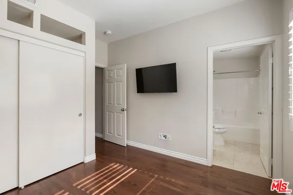 a view of a livingroom with wooden floor