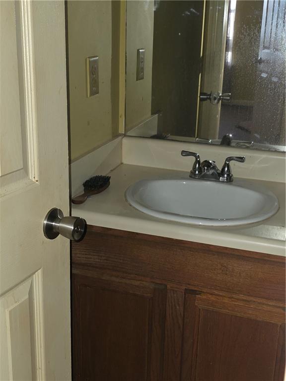 3484 Kingswood Trail Decatur, GA 30034 - Photo 20 of 37 a bathroom with a sink and a mirror