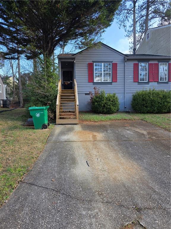 3484 Kingswood Trail Decatur, GA 30034 - Photo 2 of 37 a front view of a house with garden