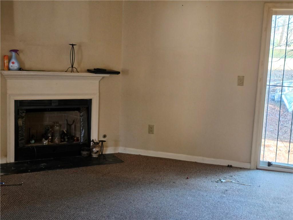 3484 Kingswood Trail Decatur, GA 30034 - Photo 25 of 37 a living room with a fireplace