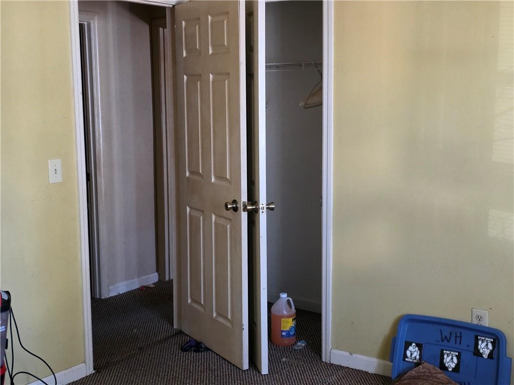 3484 Kingswood Trail Decatur, GA 30034 - Photo 27 of 37 a view of a room that has a bed and a dresser in it