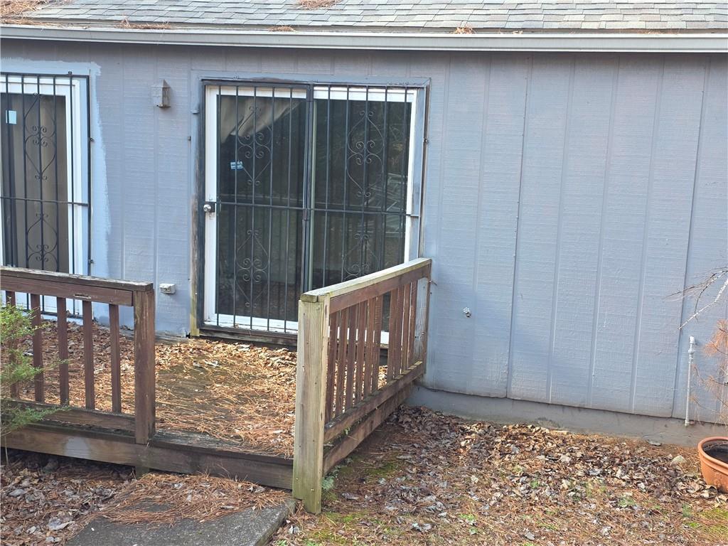 3484 Kingswood Trail Decatur, GA 30034 - Photo 3 of 37 a view of an entryway with a wooden fence