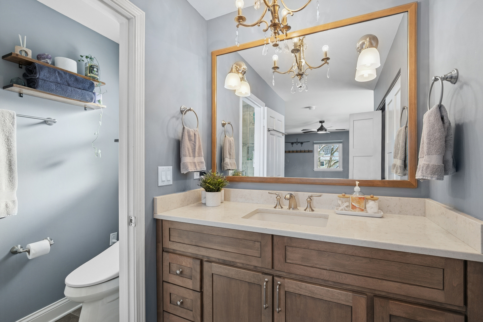 635 East Golf Road Libertyville, IL 60048 - Photo 14 of 21 a bathroom with a sink vanity granite and toilet