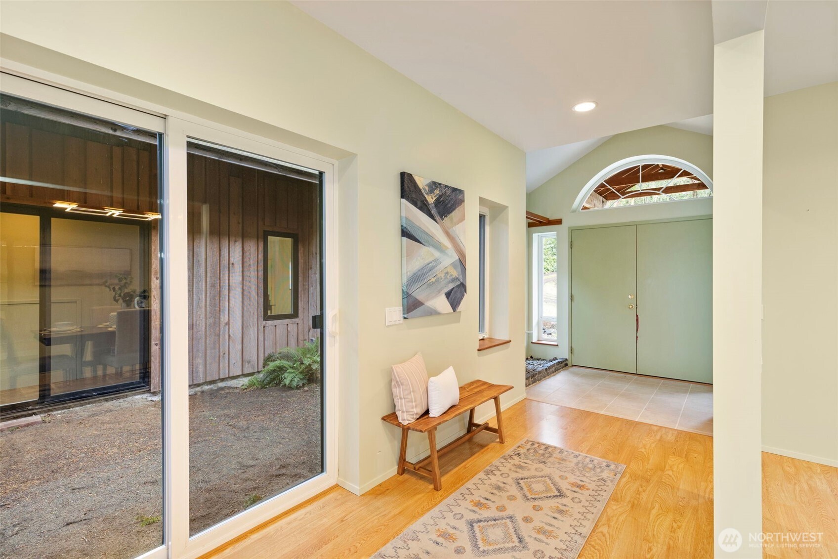 824 Schwartz Road Nordland, WA 98358 - Photo 11 of 40 a view of a livingroom with furniture and front door