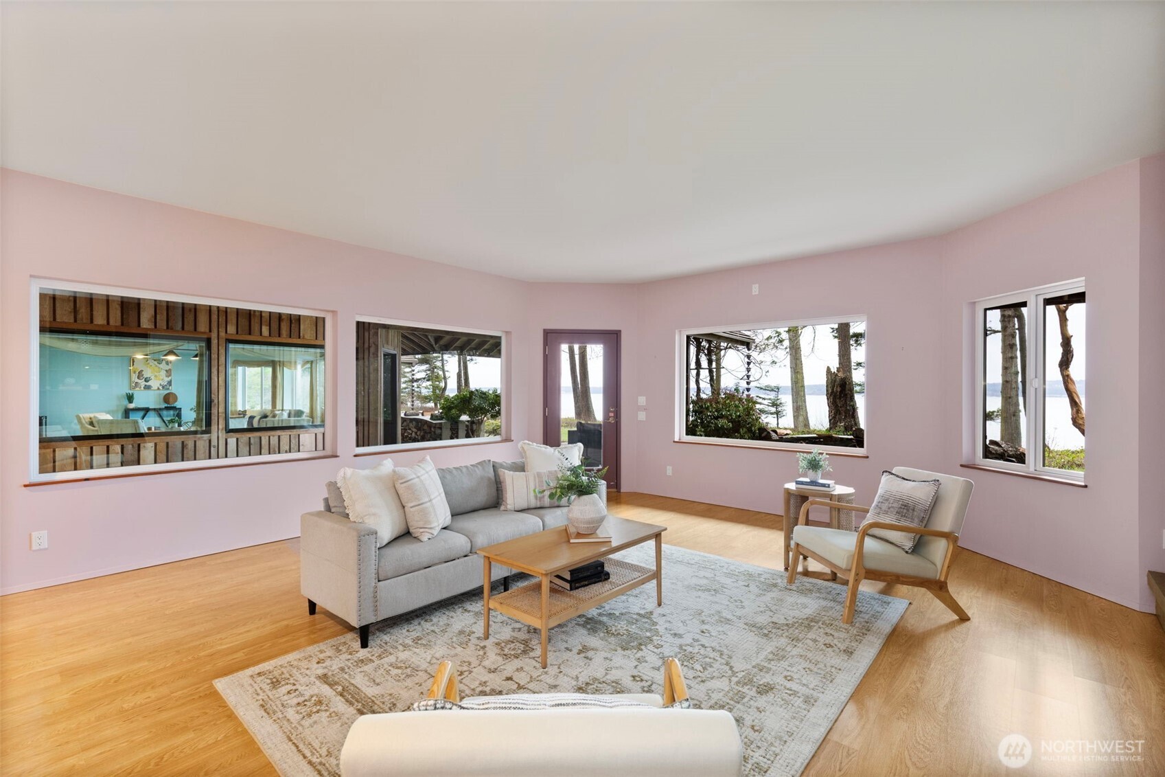 824 Schwartz Road Nordland, WA 98358 - Photo 13 of 40 a living room with furniture and a large window