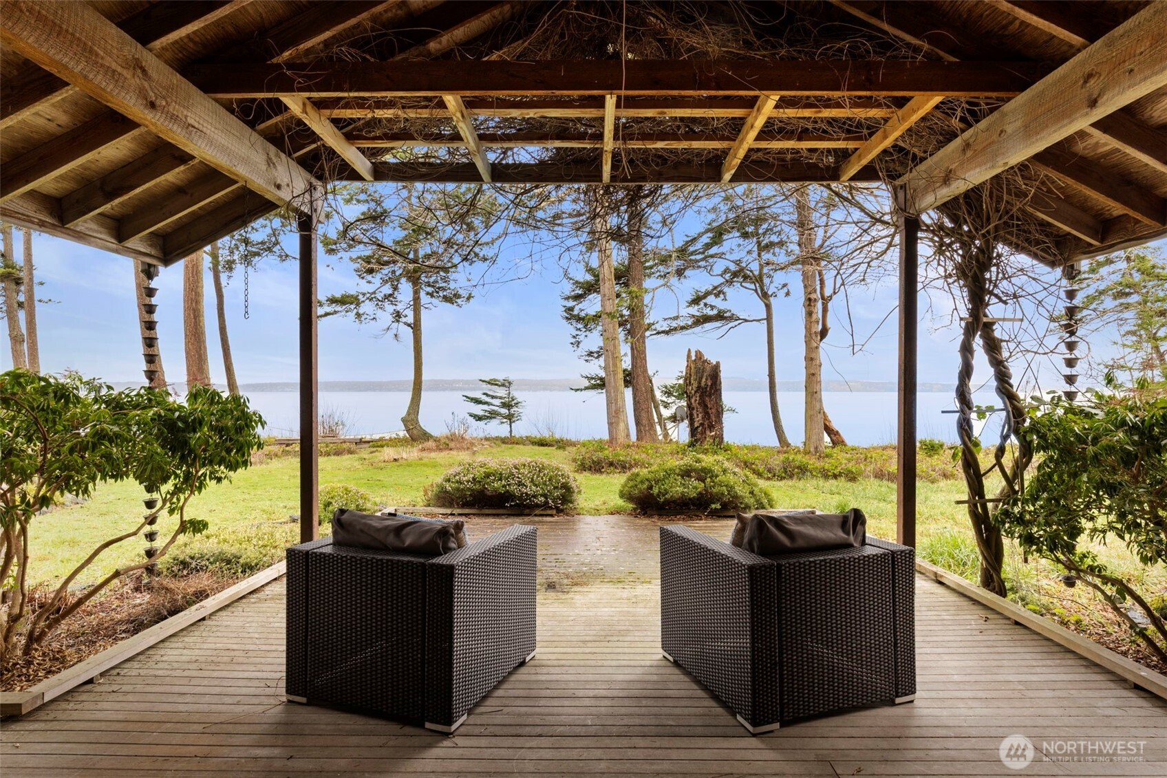 824 Schwartz Road Nordland, WA 98358 - Photo 25 of 40 a view of a couches chair and table in the patio