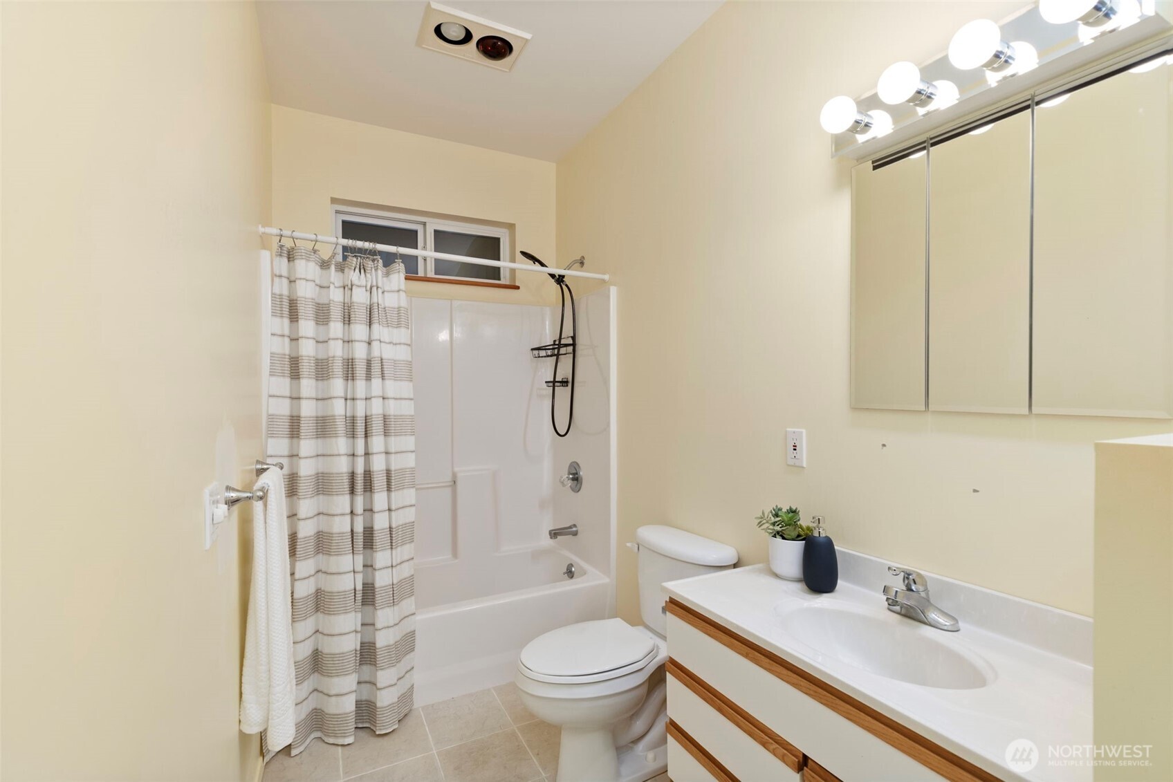 824 Schwartz Road Nordland, WA 98358 - Photo 36 of 40 a bathroom with a granite countertop sink a toilet a mirror and shower