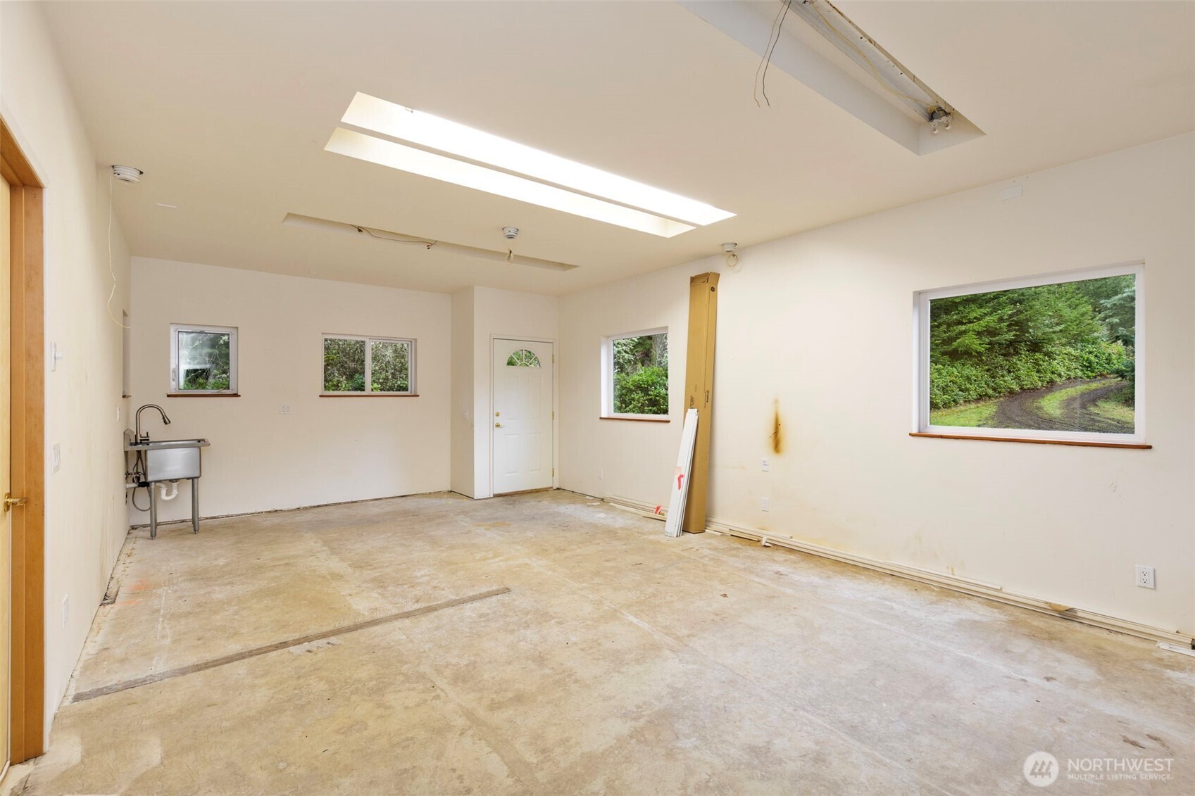 824 Schwartz Road Nordland, WA 98358 - Photo 38 of 40 a view of an empty room with a window