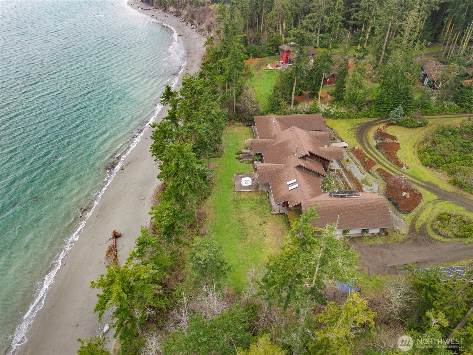 824 Schwartz Road Nordland, WA 98358 - Photo 4 of 40 a view of a house with a yard