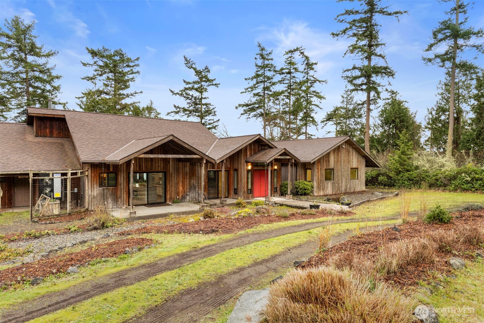 824 Schwartz Road Nordland, WA 98358 - Photo 8 of 40 a front view of a house with a yard