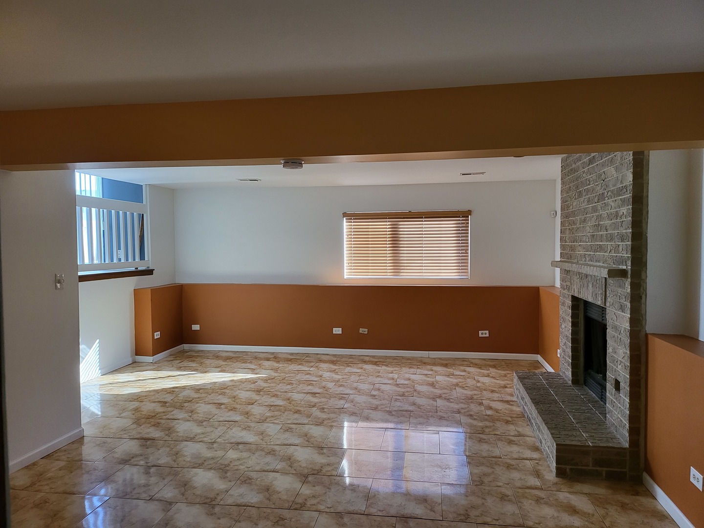 61 White Oaks Road Matteson, IL 60443 - Photo 2 of 4 a view of wooden floor and windows in a room