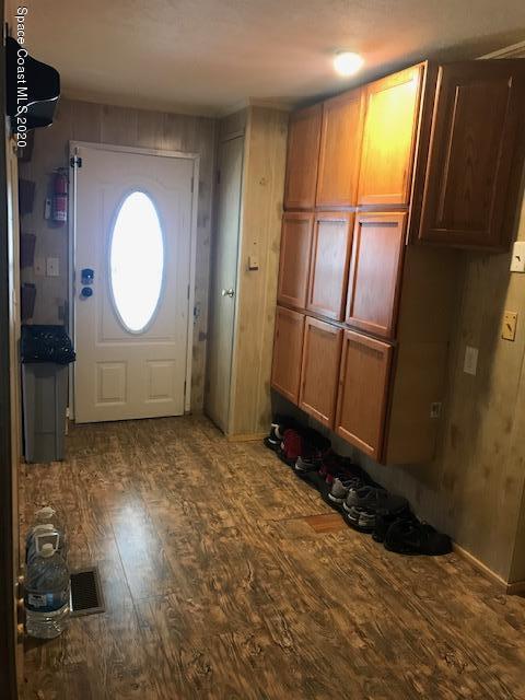 470 Baker Road Merritt Island, FL 32953 - Photo 5 of 21 a view of a room with wooden floor and window