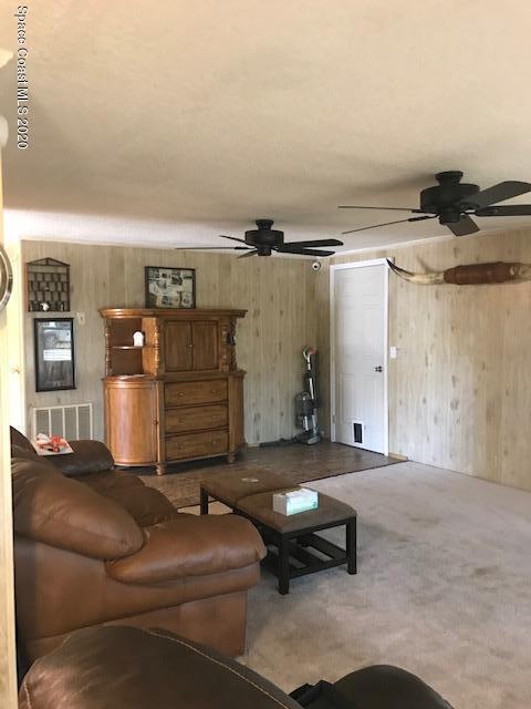 470 Baker Road Merritt Island, FL 32953 - Photo 7 of 21 a living room with furniture