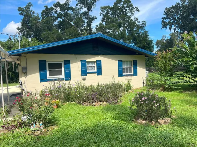 a house that has a lot of plants in it