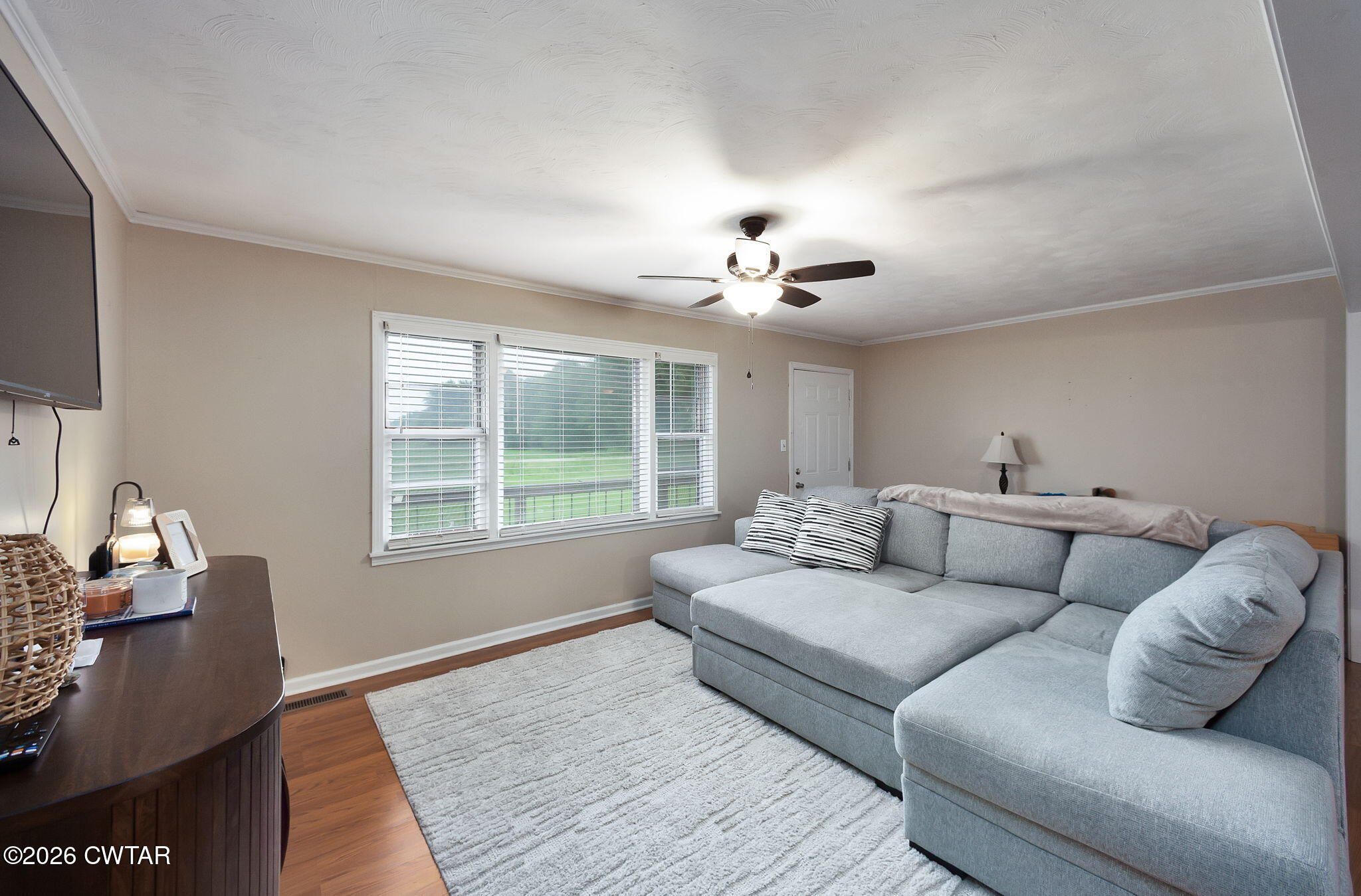 1921 Nance Road Alamo, TN 38001 - Photo 14 of 29 a living room with furniture and a flat screen tv
