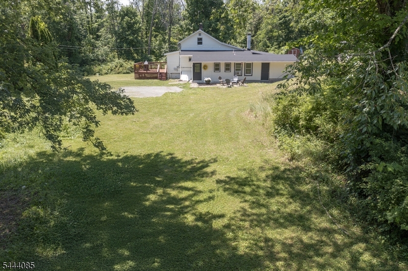 79 Lake Wallkill Road Vernon, NJ 07461 - Photo 25 of 27 a front view of house with yard and green space