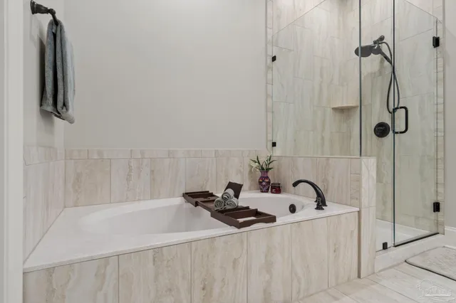 a bathroom with a sink and a shower