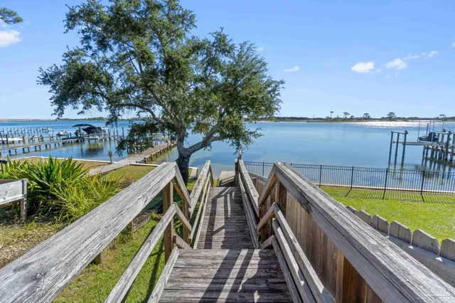 a view of swimming pool with seating area