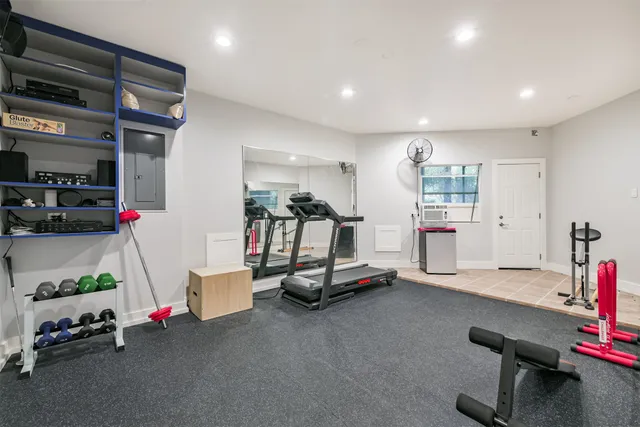a view of a room with gym equipment