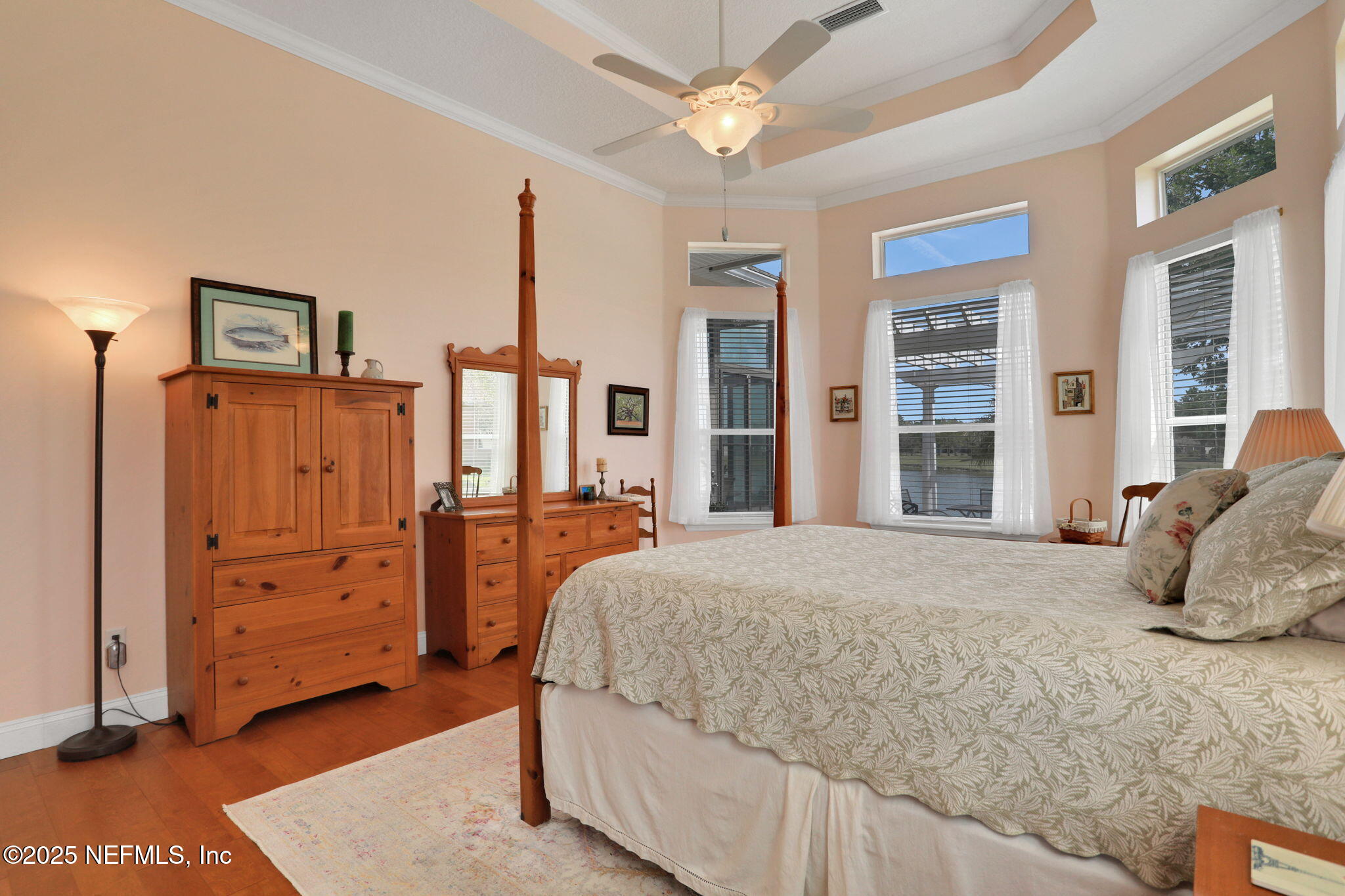 1016 Inverness Drive St. Augustine, FL 32092 - Photo 19 of 59 a bedroom with a bed and a dresser