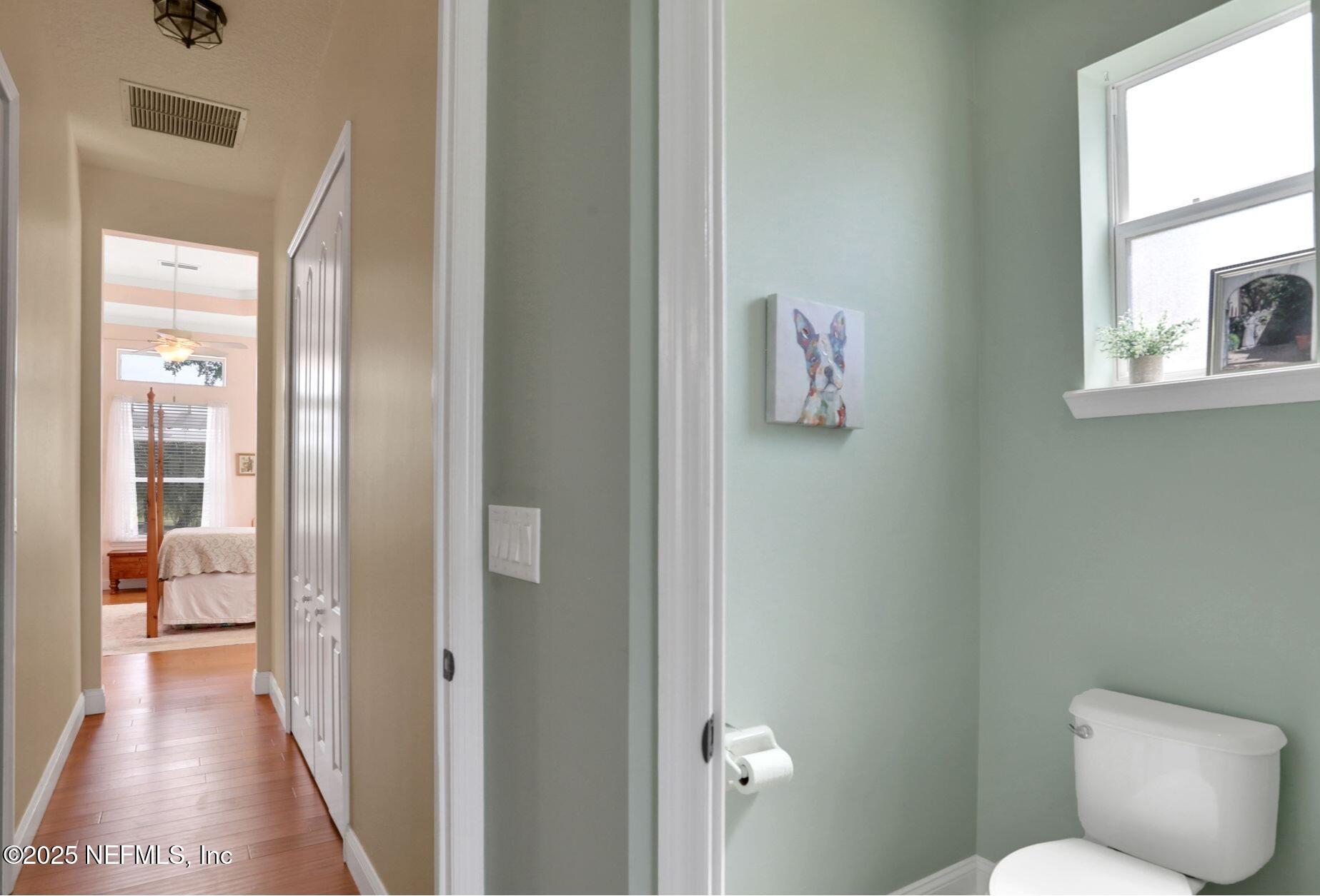 1016 Inverness Drive St. Augustine, FL 32092 - Photo 24 of 59 a bathroom with a toilet and a shower