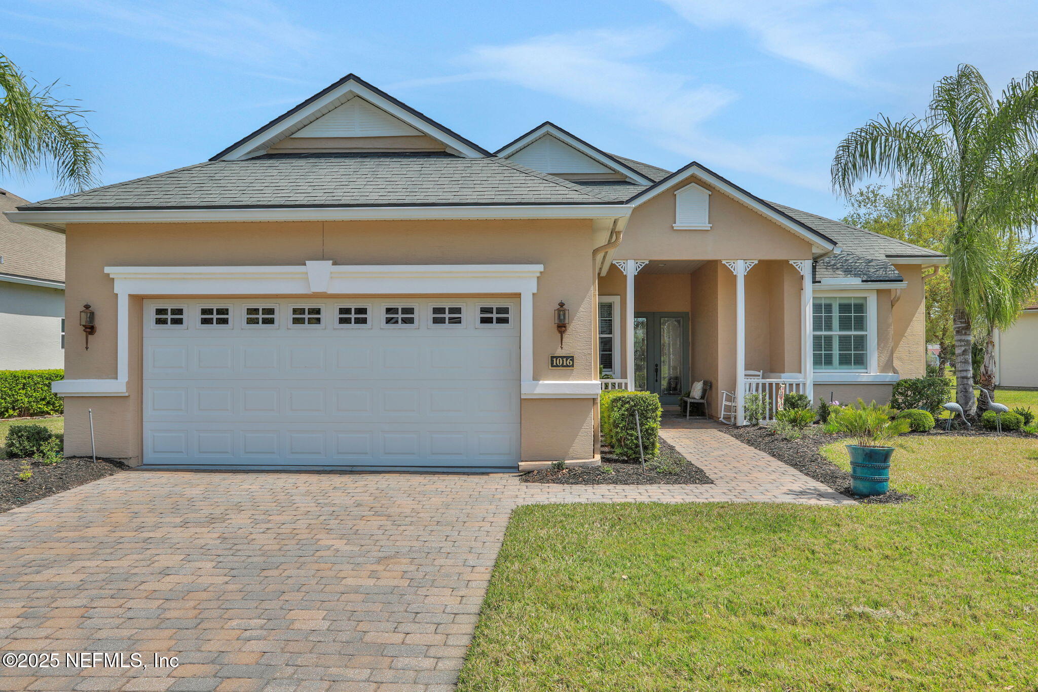 1016 Inverness Drive St. Augustine, FL 32092 - Photo 3 of 59 a front view of a house with garden